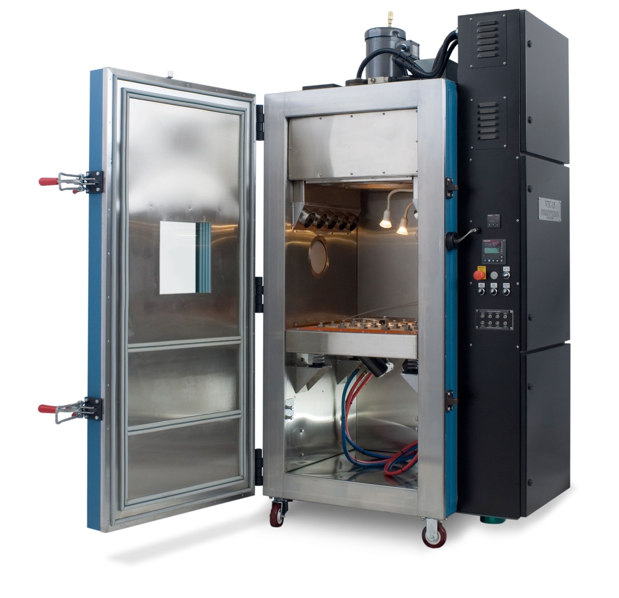 Hanse VTC-1.5 HALT/HASS chamber with its door open, showing the vibration table and the workspace